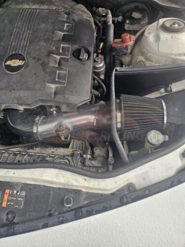 Rtunes Racing HI-CH-05 heat shield cold air intake installed in engine bay